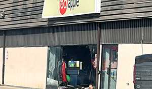 Driver smashes through front of Red Apple